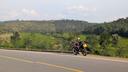 Ruanda Auslandssemester - Blick auf ein Motorrad und eine malerische Landschaft im Hintergrund