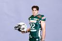 Ein junger Mann in American-Football-Ausrüstung.