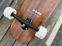 A picture of a longboard which was designed by HHN in collaboration the brand Pogo Boards
