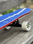 A picture of a longboard which was designed by HHN in collaboration the brand Pogo Boards