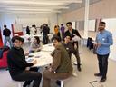 The picture shows a group of international students.